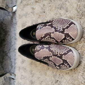 Michael Kors snakeskin slip on shoes.